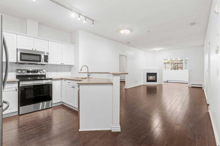 Property Photo:  126 14 Avenue SW 117  AB T2R 0L9 
