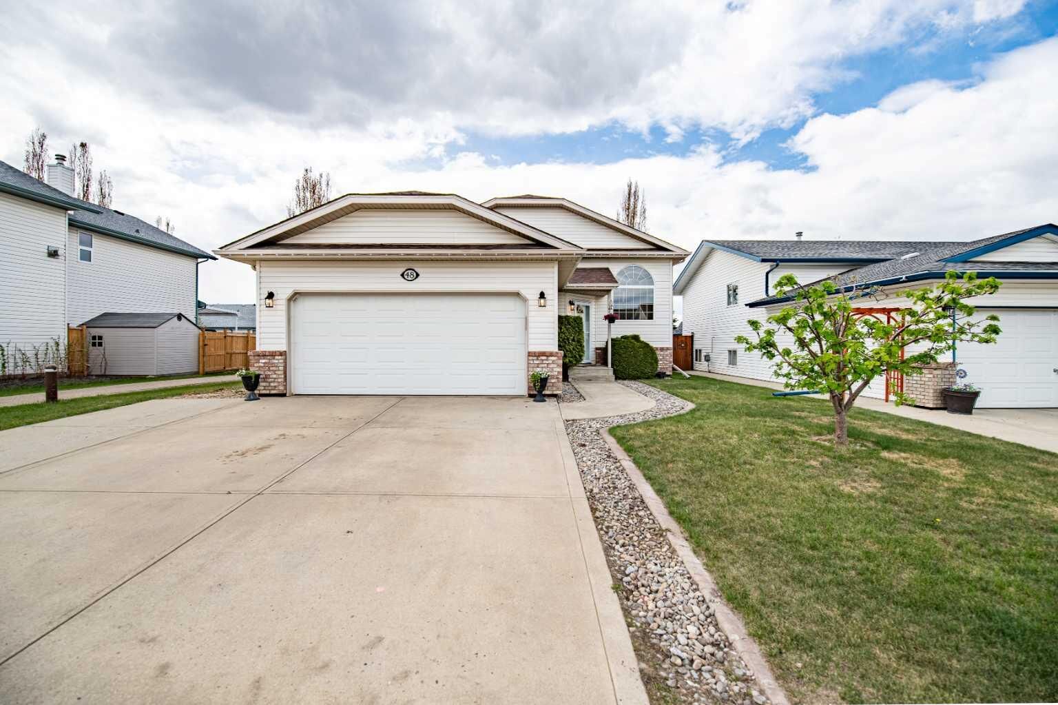Property Photo: 48 Reichley Street AB T4P 3S3