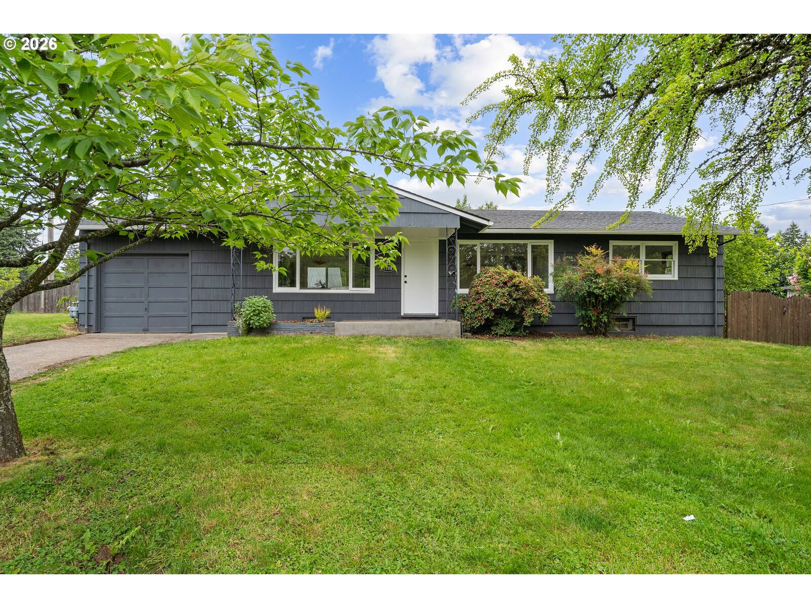 Property Photo:  1100 SE 114th Pl  OR 97216 