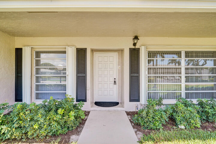 Property Photo: 2521 Juniper Drive 11-B FL 33445
