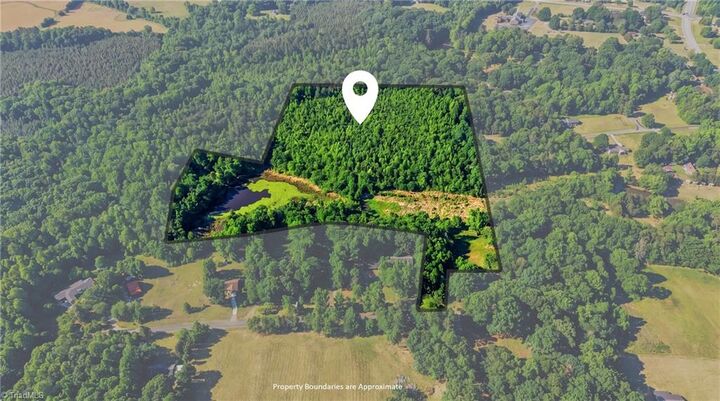Property Photo:  3228 Jidemi Road  NC 27406 