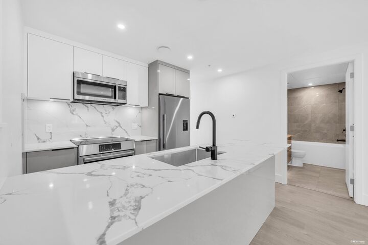 Property Photo: 2210 E 1st Avenue BC V5N 0K2