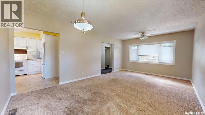 Property Photo:  5445 4th Avenue  SK S4T 0J8 