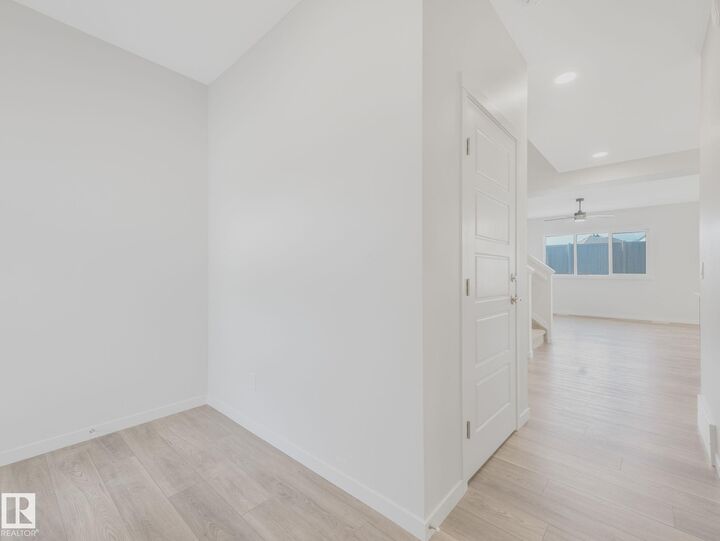 Property Photo:  20723 24 Avenue NW  AB T6M 2C4 