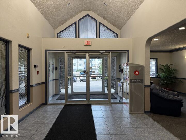 Property Photo: 16303 95 Street NW 316 AB T5Z 3V1
