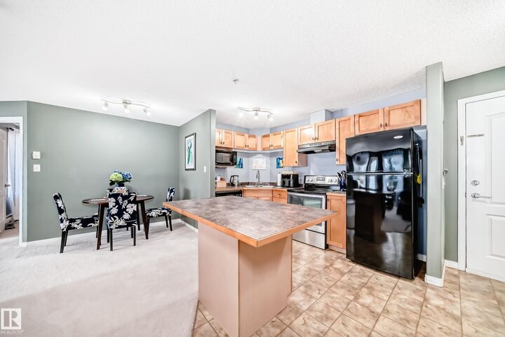 Property Photo: 5340 199 Street NW 205 AB T6M 0A5