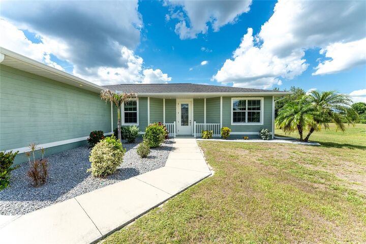 Property Photo: 546 Santiguay Street FL 33983