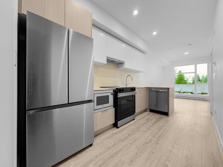 Property Photo:  10828 139A Street 4xx  BC V3R 3E5 