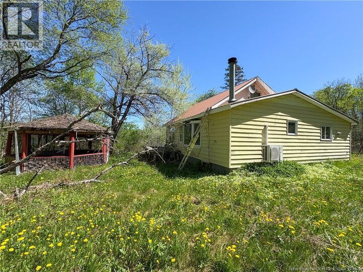 Property Photo:  284 Main Street  NB E6H 1E5 