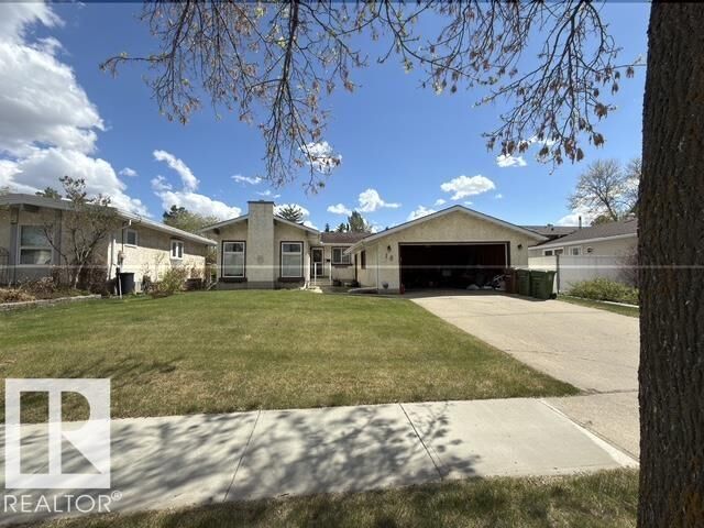 Property Photo: 18 Latimer Place AB T8N 2J5