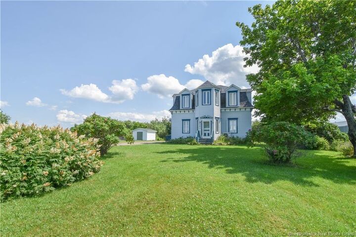 Property Photo: 283 Acadie Street NB E8N 1B9