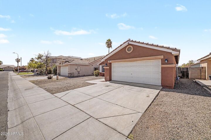 Property Photo:  9961 W Mackenzie Drive  AZ 85037 