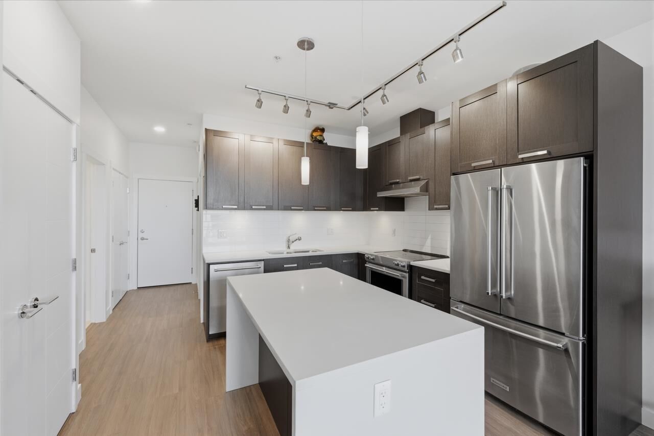Property Photo: 5638 201A Street 511 BC V3A 0L8