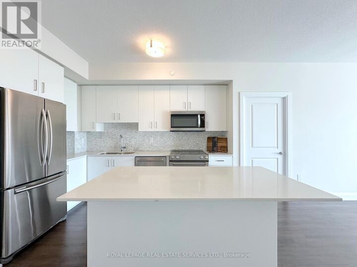 Property Photo:  2333 Taunton Road 209  ON L6H 0N5 