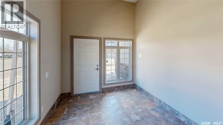 Property Photo:  8018 Fairways West Drive  SK S4Y 0A5 