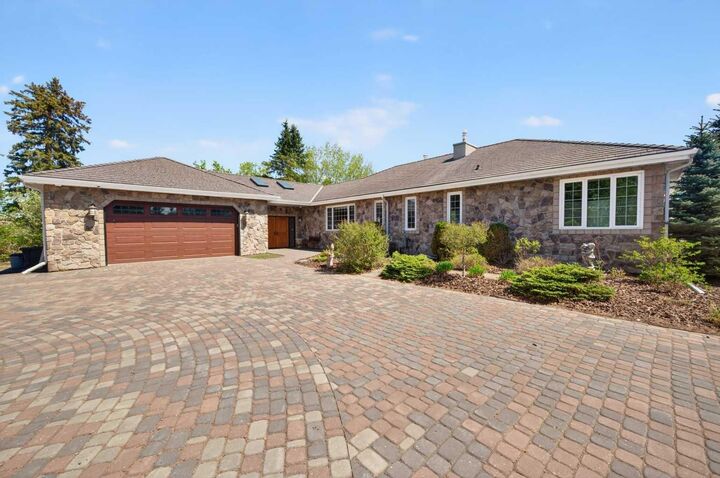Property Photo: 5930 C + E Trail AB T4H 2H1