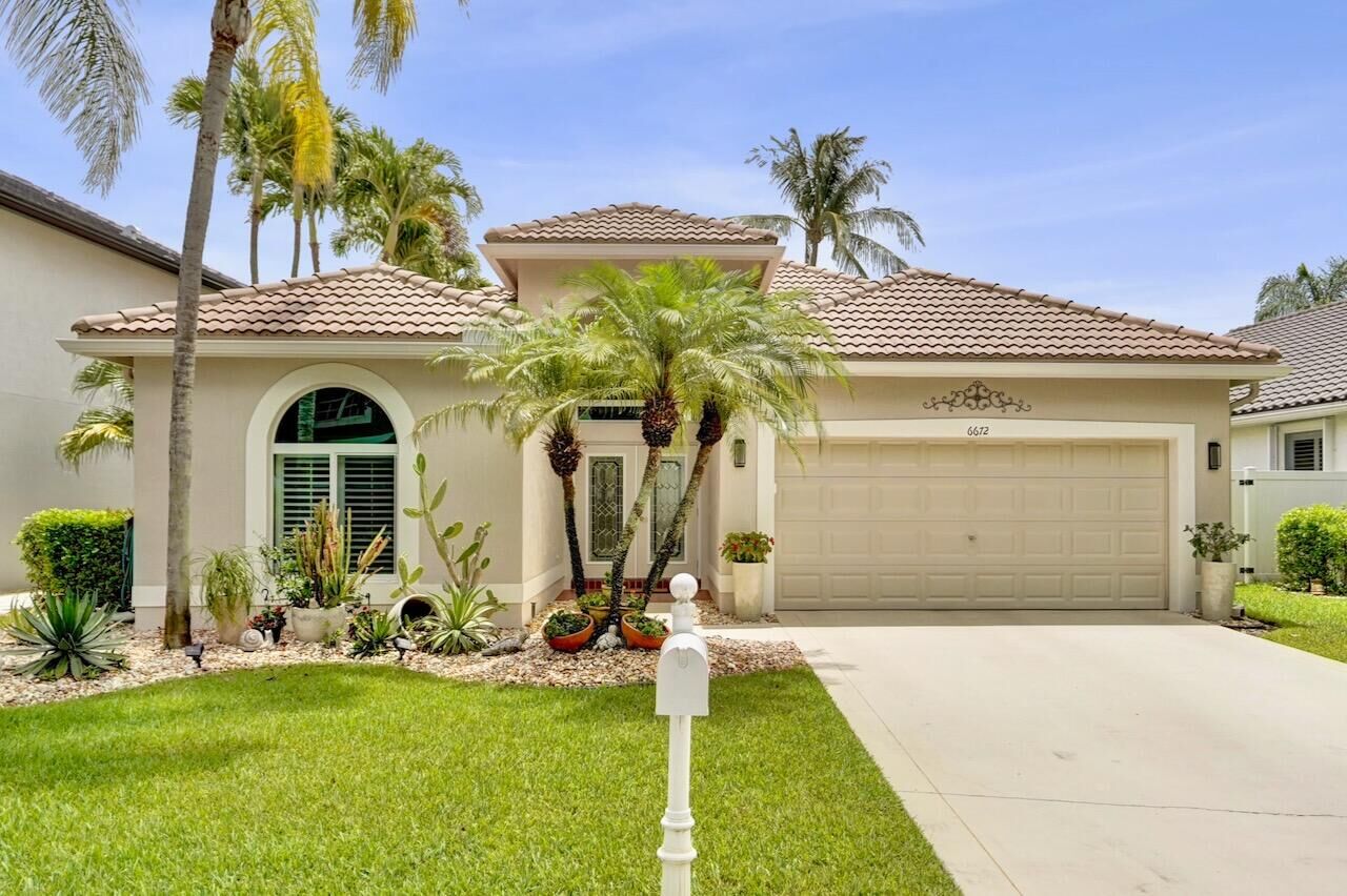 Property Photo:  6672 Remington Place  FL 33463 
