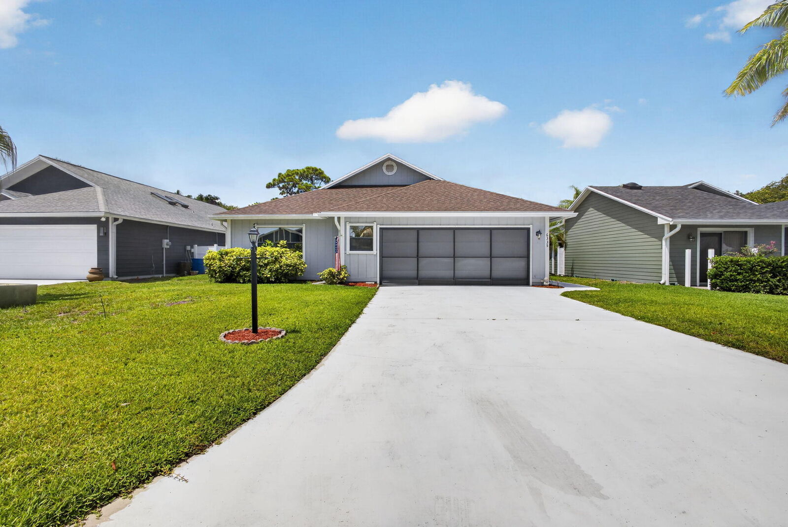 Property Photo: 6335 SE Ames Way FL 33455
