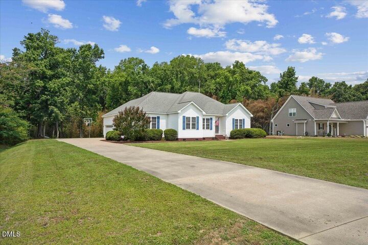 Property Photo:  205 Millbrook Village Drive  NC 27530 