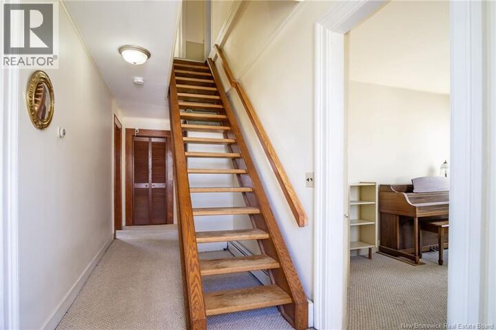Property Photo:  697 Bay Street  NB E2M 7L6 