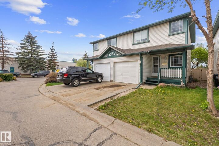Property Photo: #2 15215 126 St NW AB T5X 5Z3