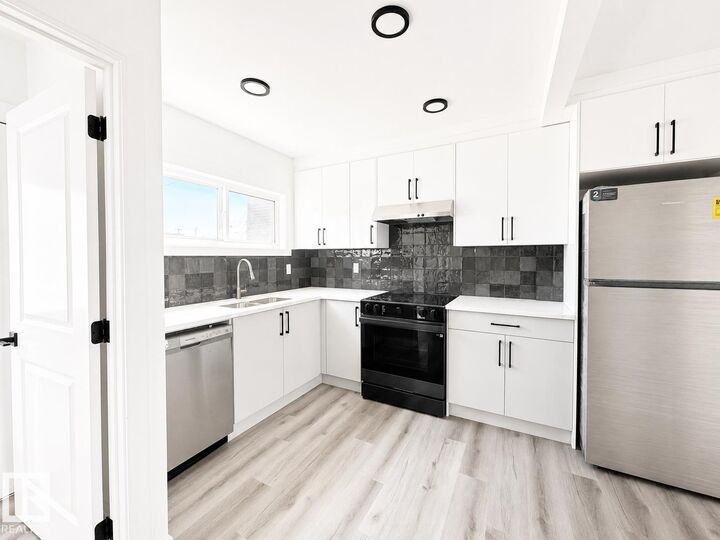 Property Photo: 12717 116 Street NW AB T5E 5H1