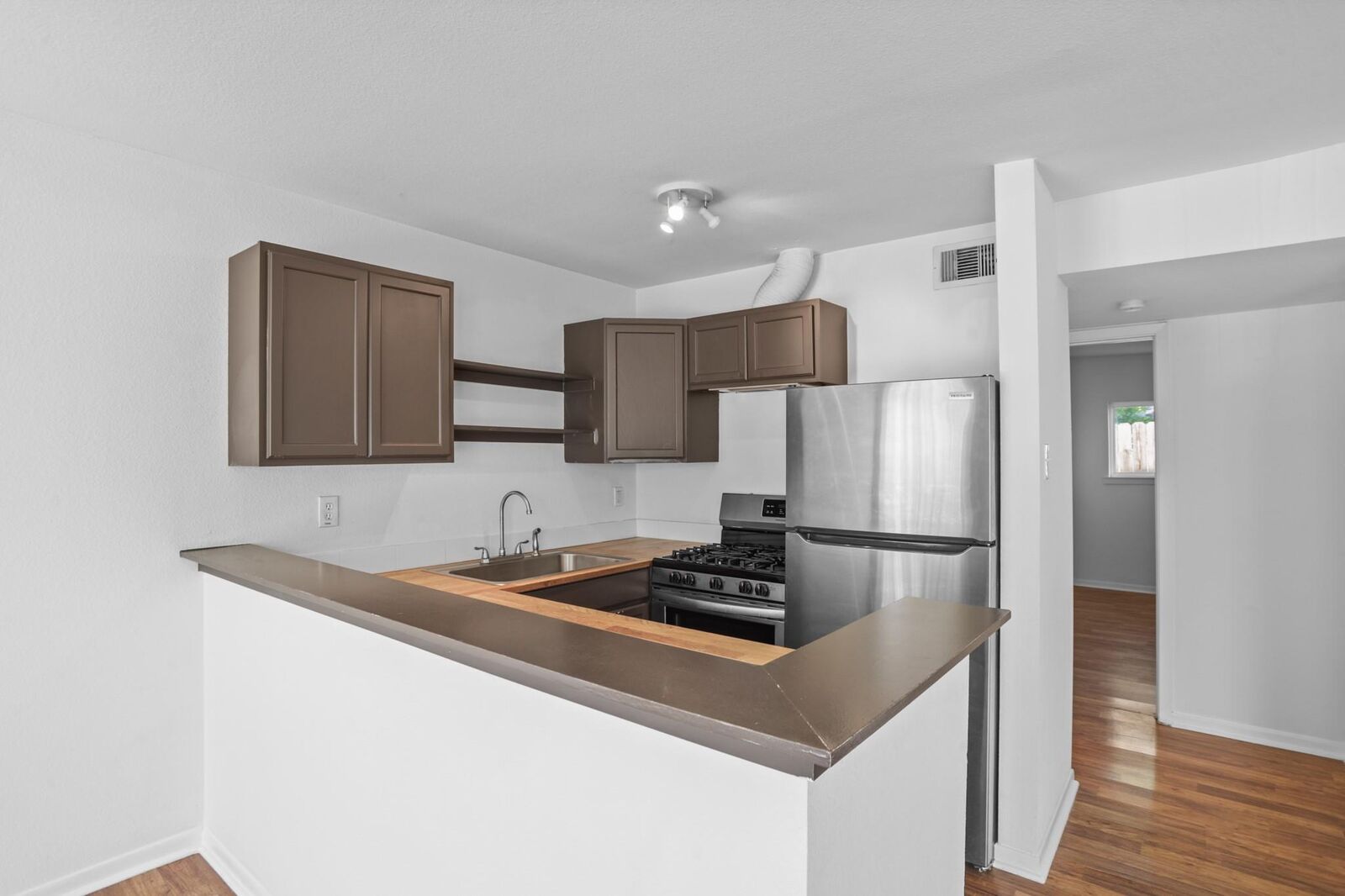 Property Photo:  1408 Hughes Street 15  TX 77023 