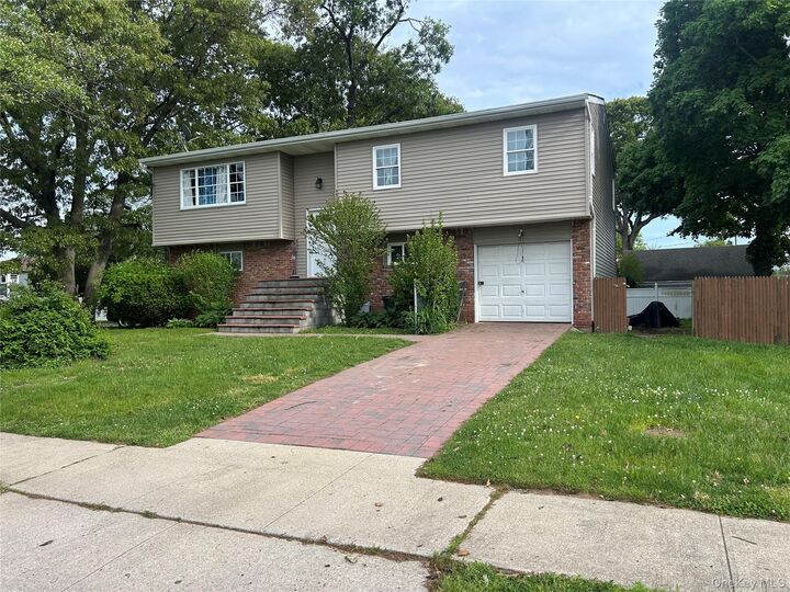 Property Photo:  9 Oakley Street  NY 11758 