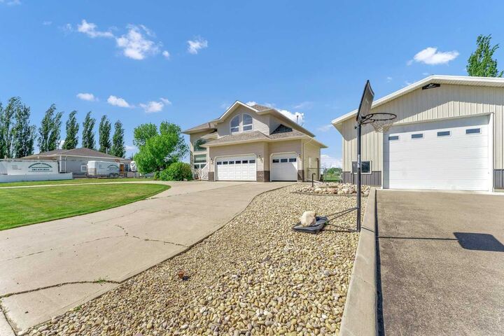 Property Photo: 190014 12 Street W 99 AB T1R 1C7