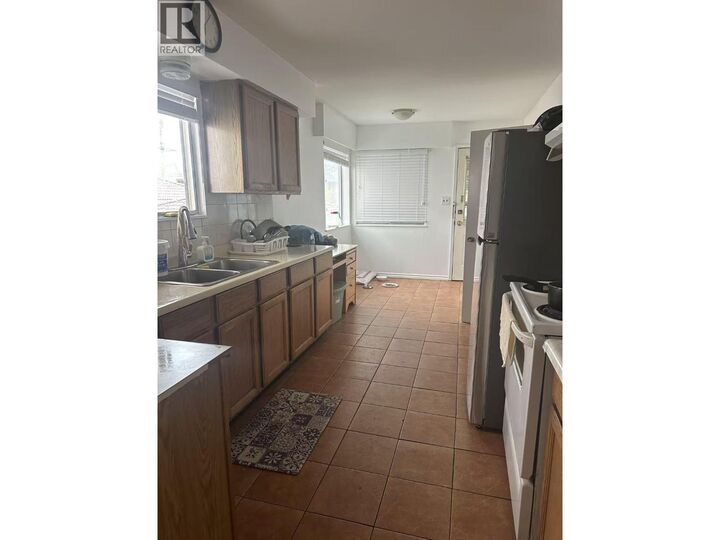 Property Photo:  1380 East 54th Avenue  BC V5X 1M4 