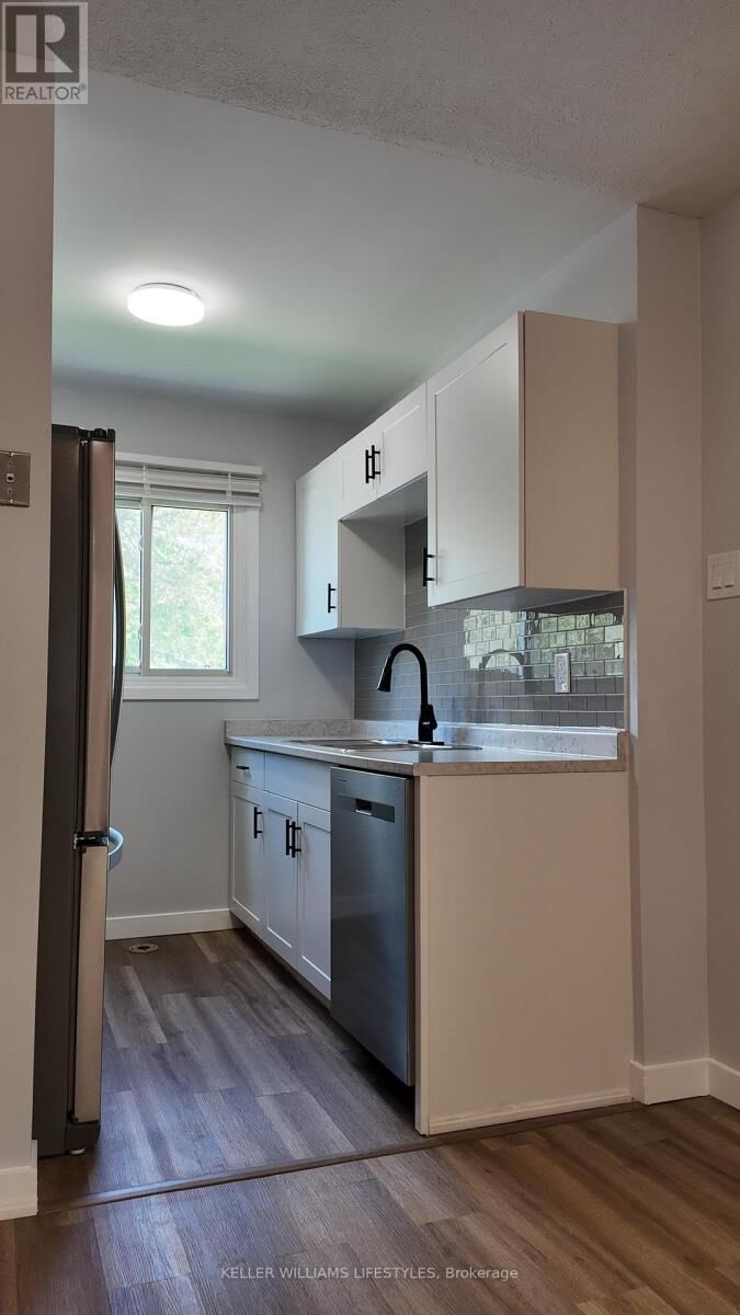 Property Photo: 166 Southdale Road West 58 ON N6J 2J1