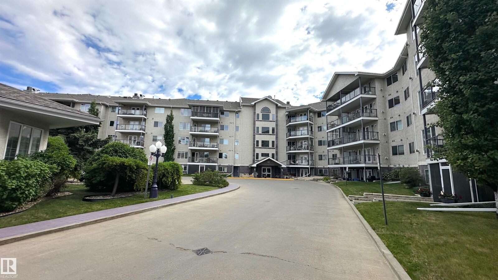 Property Photo: 237 Youville Drive NW 218 AB T6L 7G2