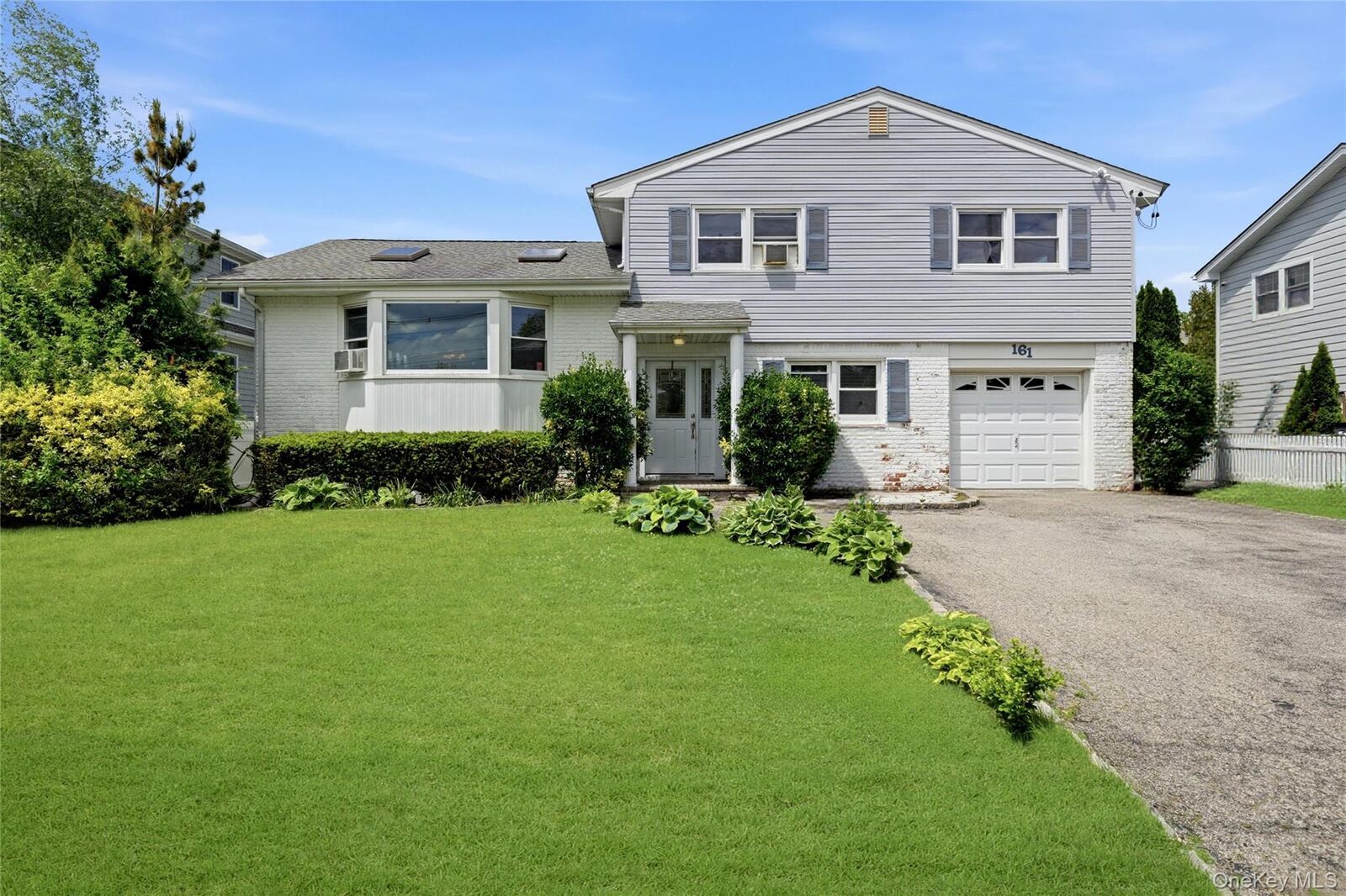 Property Photo:  161 Sunset Road  NY 11758 