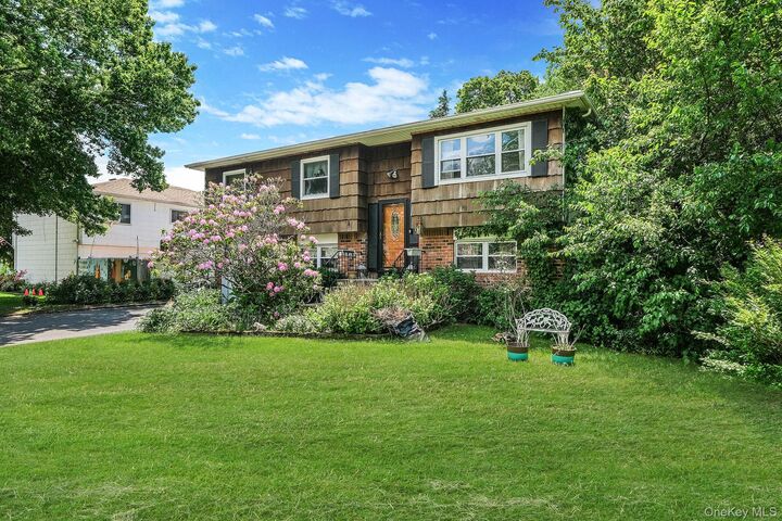 Property Photo:  4 Dogwood Avenue  NY 11738 