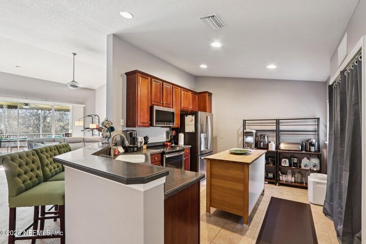 Property Photo: 6604 White Blossom Court 10H FL 32258