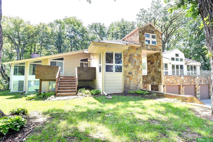 Property Photo:  6018 Country Club Oaks Plaza  NE 68152 