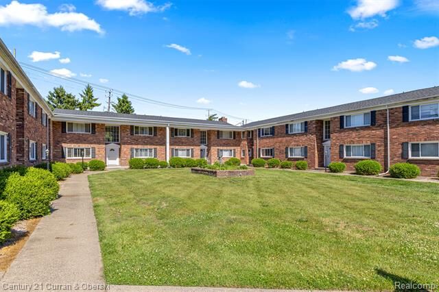 Property Photo:  31831 Grand River Avenue 33  MI 48336 