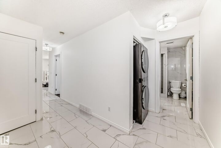 Property Photo:  9815 159 Avenue NW  AB T5X 4V6 