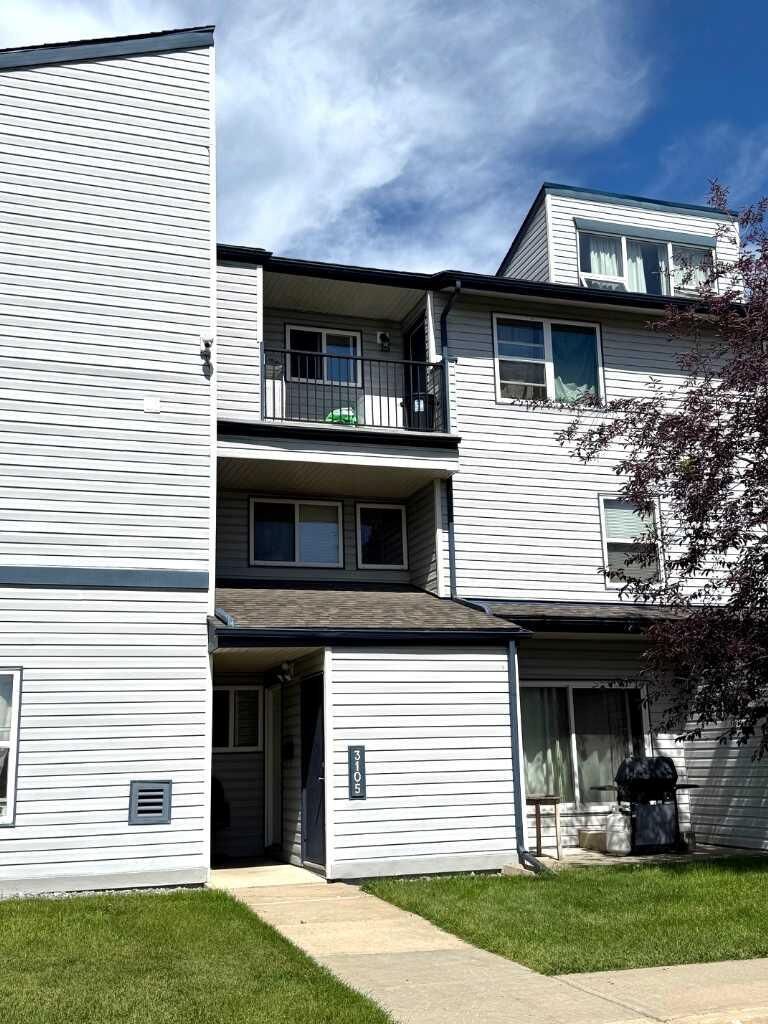 Property Photo: 7201 Poplar Drive 3105 AB T8V 6C5
