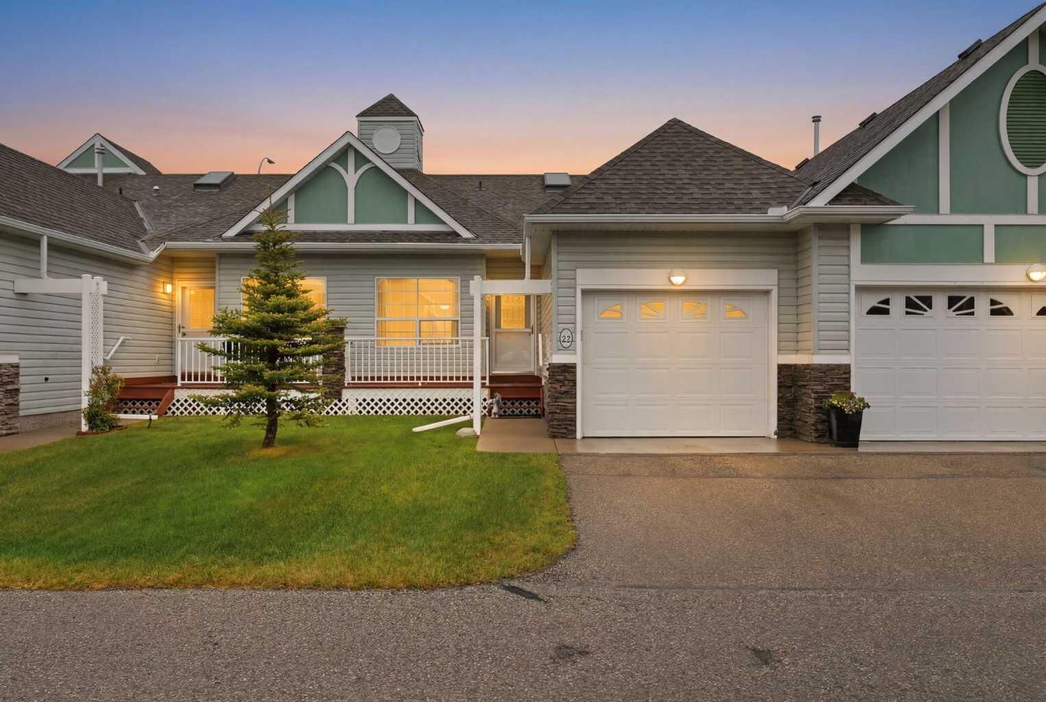 Property Photo:  1008 Woodside Way NW 22  AB T4B 2T8 