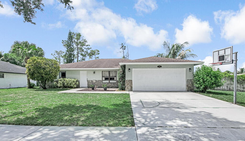 Property Photo:  100 Greenwood Court  FL 33411 