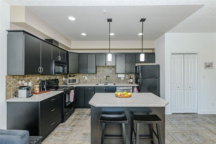 Property Photo: 3915 Carey Rd #205 BC V8Z 1Z6