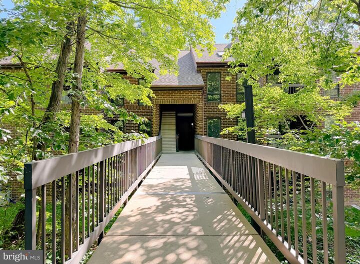 Property Photo:  23250 Chestnut Oak Court 8C  MD 20619 