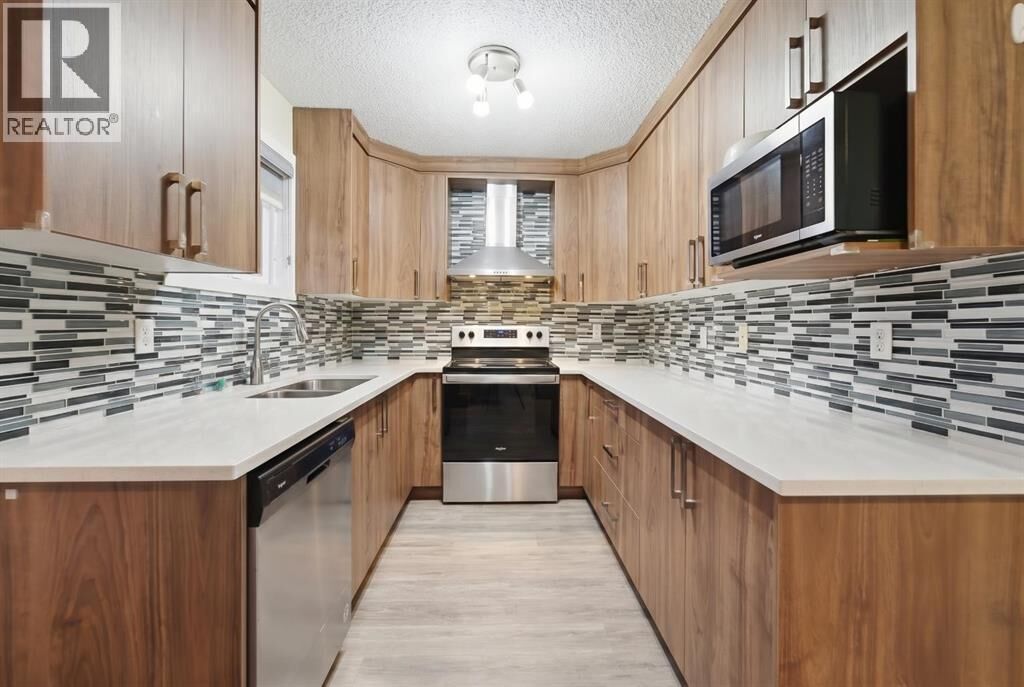 Property Photo:  53 Falchurch Road Northeast  AB T3J 1G6 