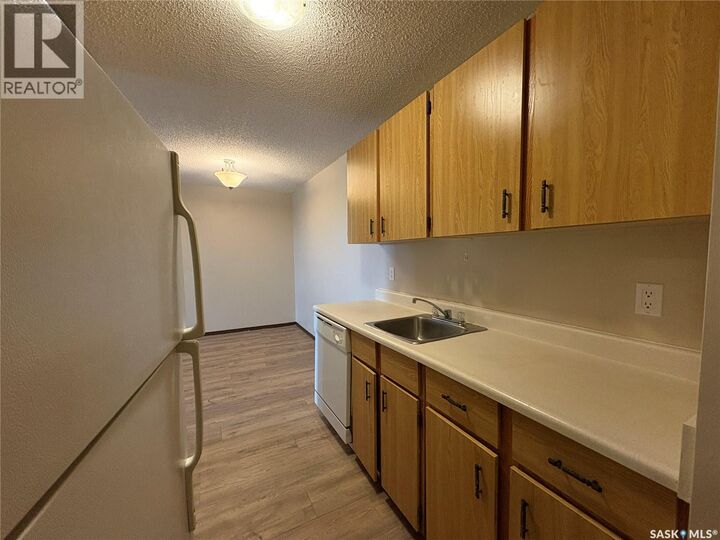 Property Photo:  303 1140 9th Avenue NE  SK S9H 2S9 