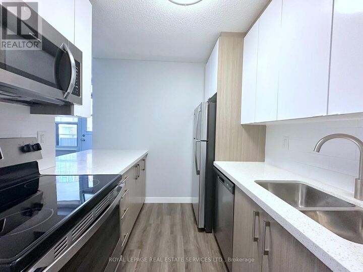 Property Photo:  265 Main Street 211  ON M4C 4X3 