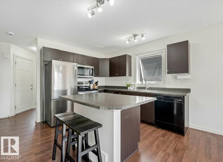 Property Photo: 5101 Soleil Boulevard 26 AB T4X 0E3