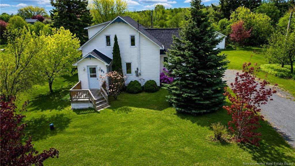 Property Photo:  91 Rue Du Parc Ouest  NB E8J 2Y1 