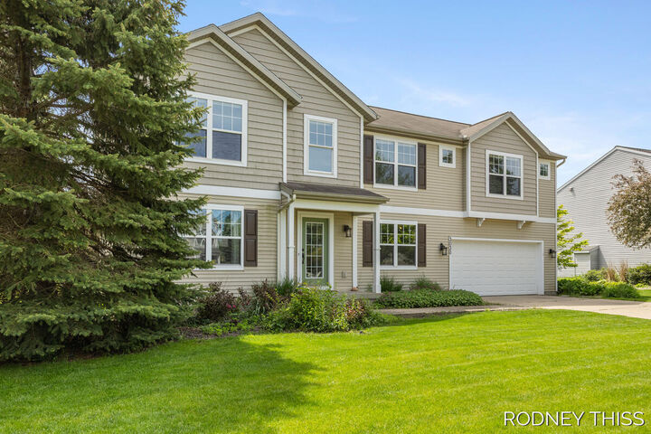 Property Photo:  3030 Sunchase Avenue  MI 49426 