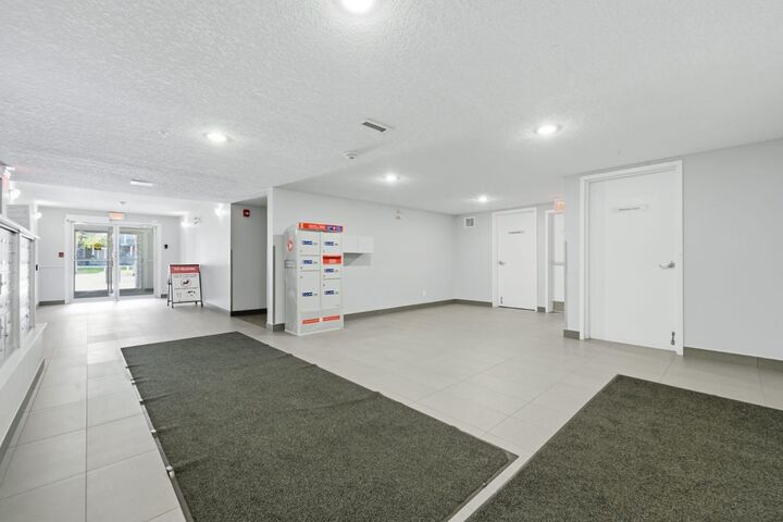 Property Photo:  115 Prestwick Villas SE 2223  AB T2Z 0M9 